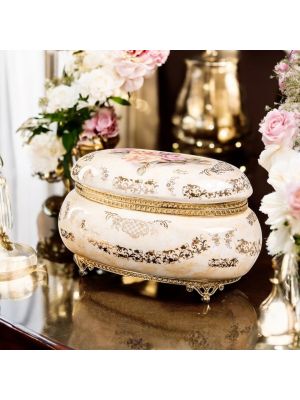 Box, elegante Schmuckschatulle aus luxuriöser Keramik, mit raffinierten Golddetails.
