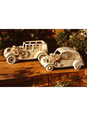 Ford und Cytroen, Keramikautos mit Rosen, Kristallen und Golddetails, handgefertigt.