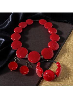 Exklusives Set handgefertigten Schmucks aus Muranoglas: Halskette, Armband und Ohrringe.
